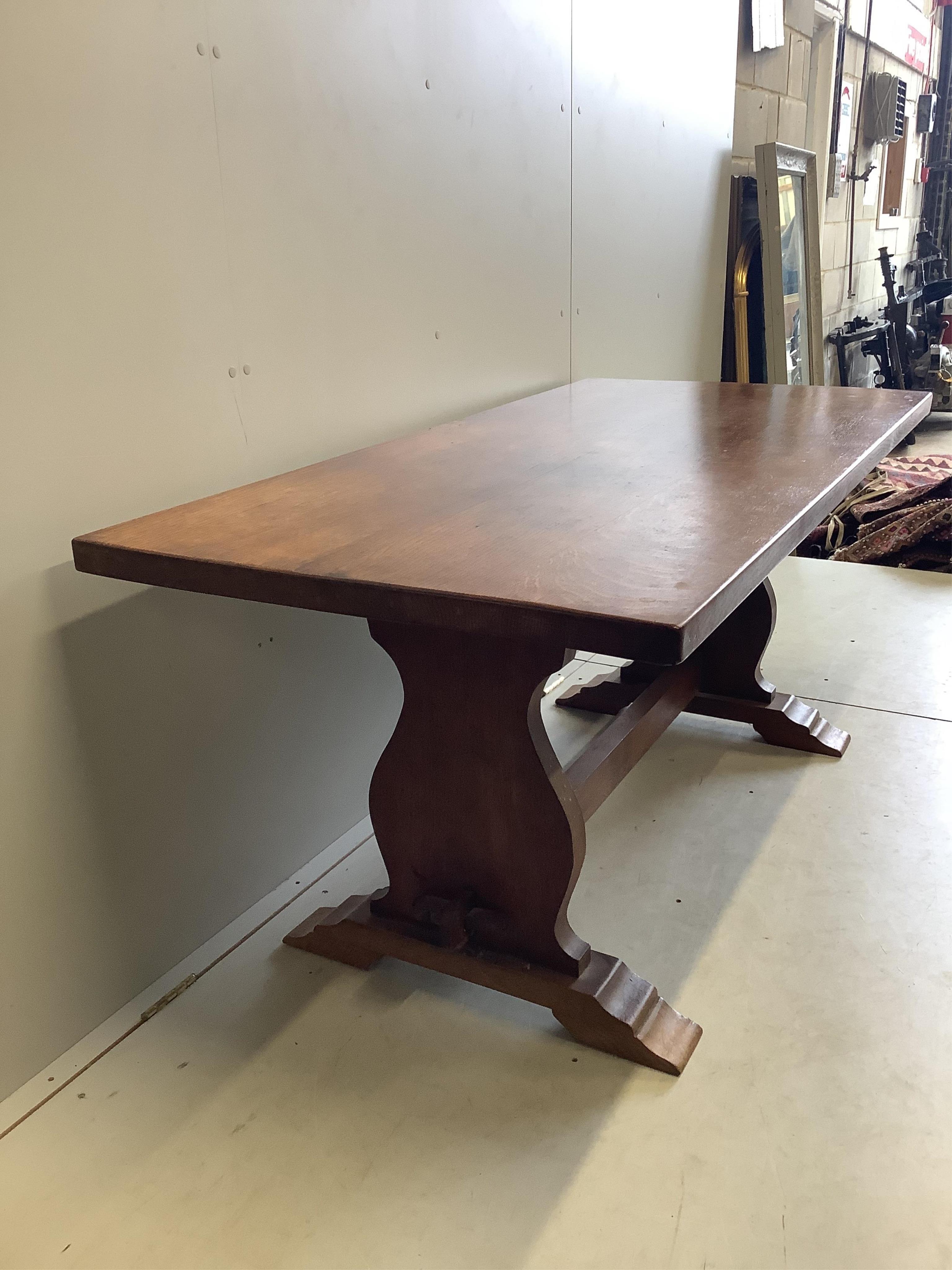 A 17th century style rectangular topped oak refectory table, width 168cm, depth 79cm, height 74cm. Condition - fair